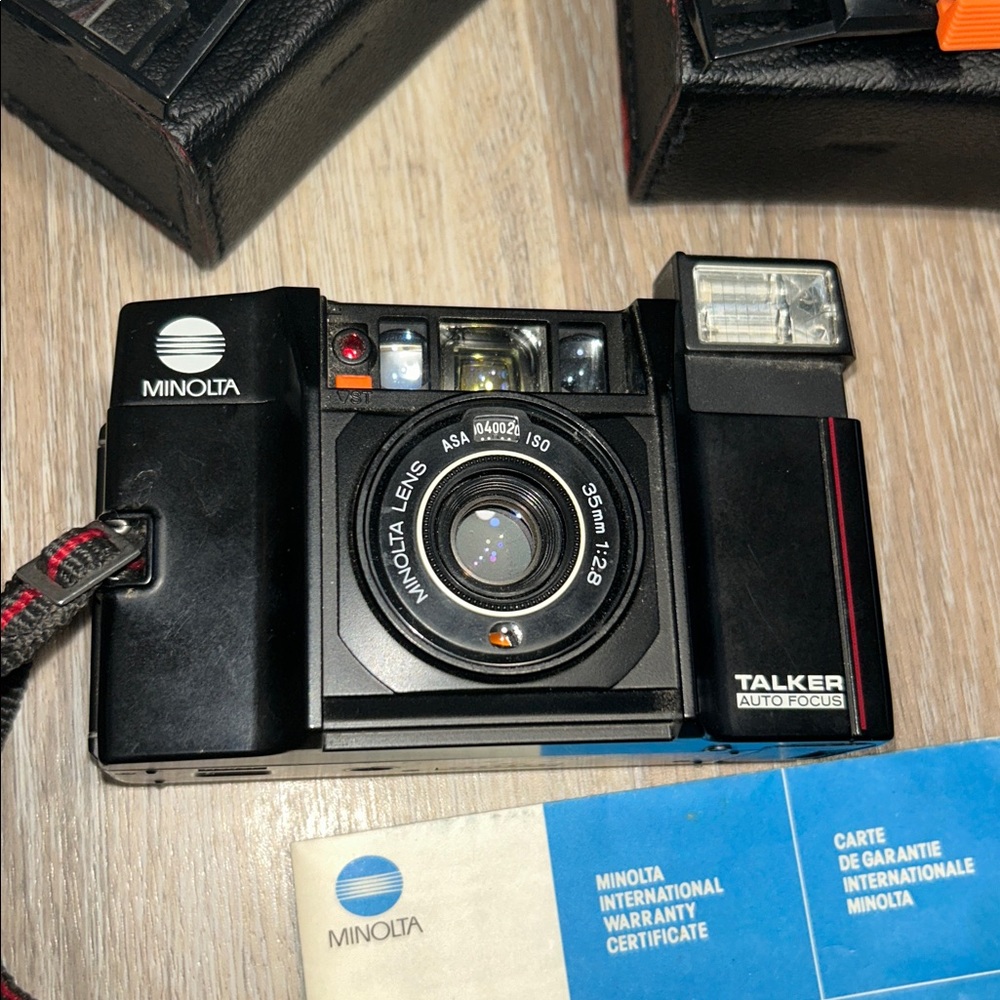 Minolta Talker Auto Focus 35mm Camera w/ flash, Case, two Lens. Tested